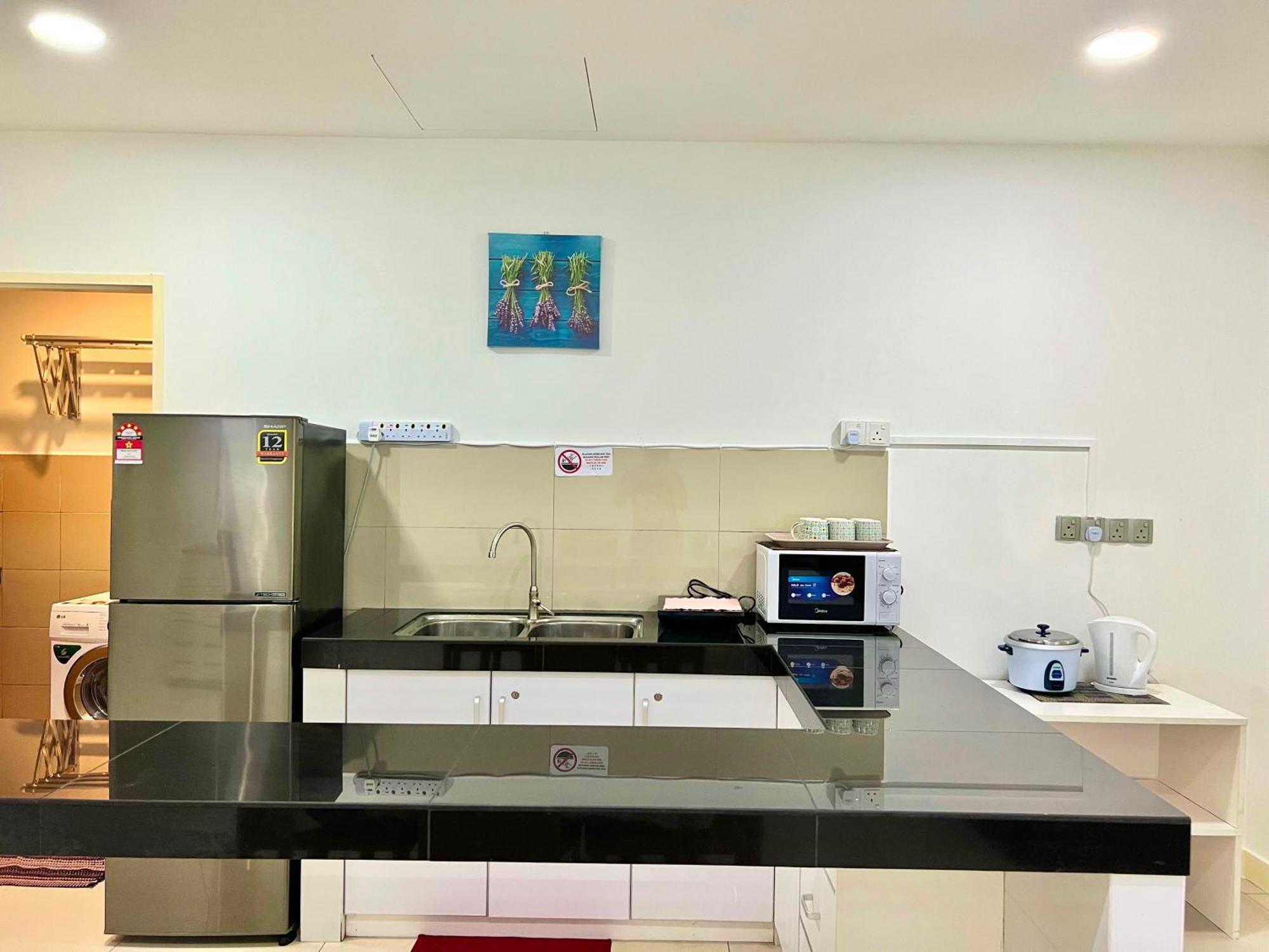 Capital O 90987 The Loft Residences Homestay @ Imago Shopping Mall 2 Kampong Sembulan Extérieur photo